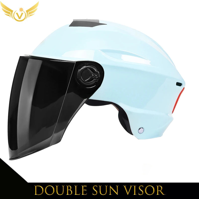 Light blue helmet with black visor on a white background