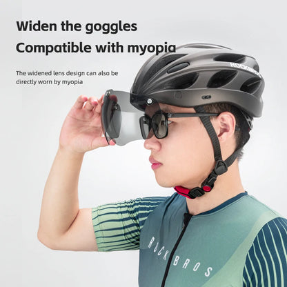 Person wearing a helmet and sunglasses with text about widened goggles compatible with myopia.